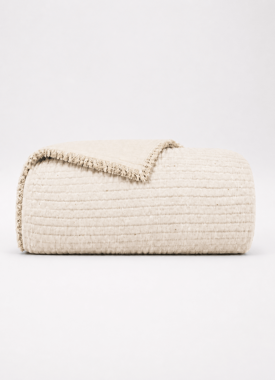 AirWeave Muslin coverlet in Shell — hero shot of breathable Turkish cotton muslin