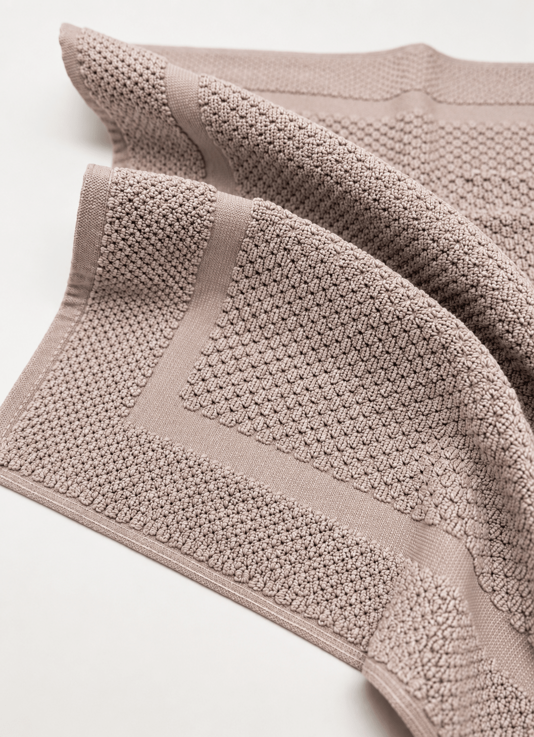 Haven bath mat in Dusty Rose — close-up of raised woven detail and clean border