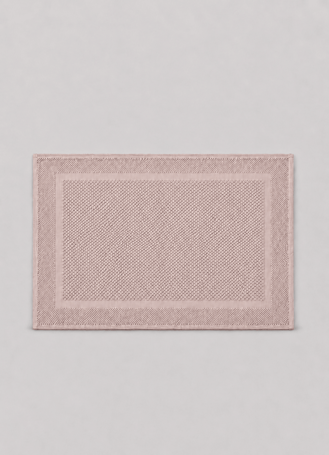 Haven bath mat in Dusty Rose — hero shot of spa-inspired Turkish cotton bath mat