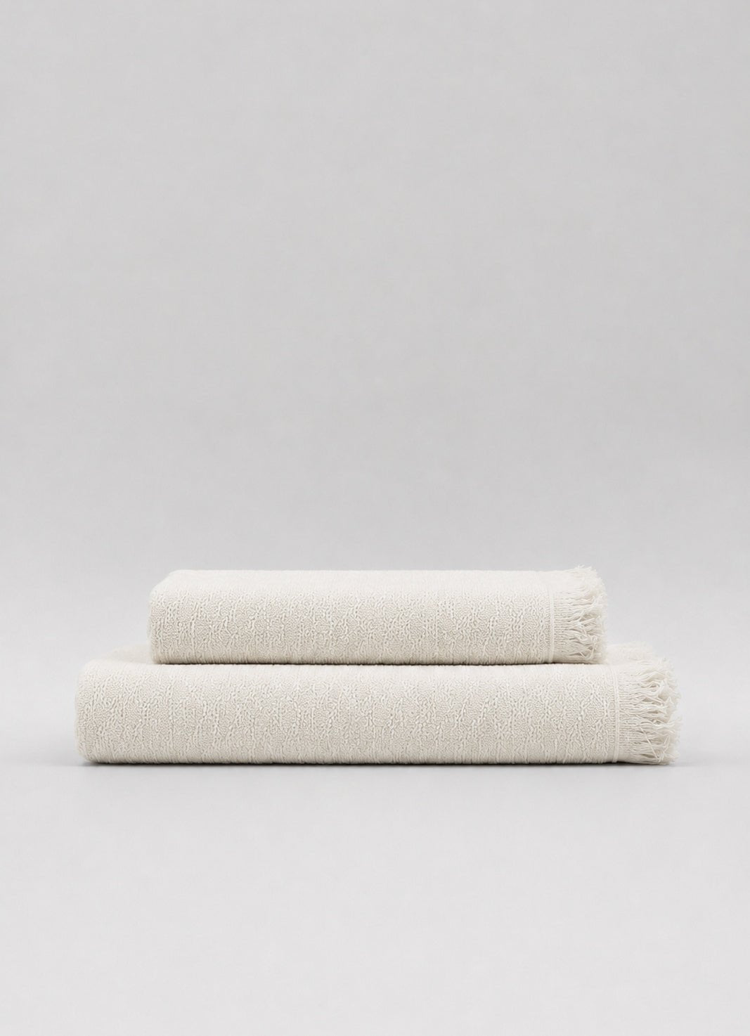 Luma fringed Turkish cotton towel in Oat Veil — hero product shot