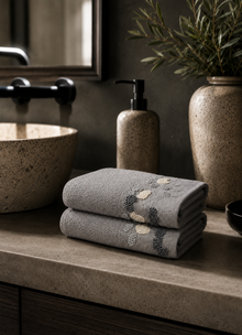 Florence Heirloom towel in Mineral — lifestyle shot in styled bathroom