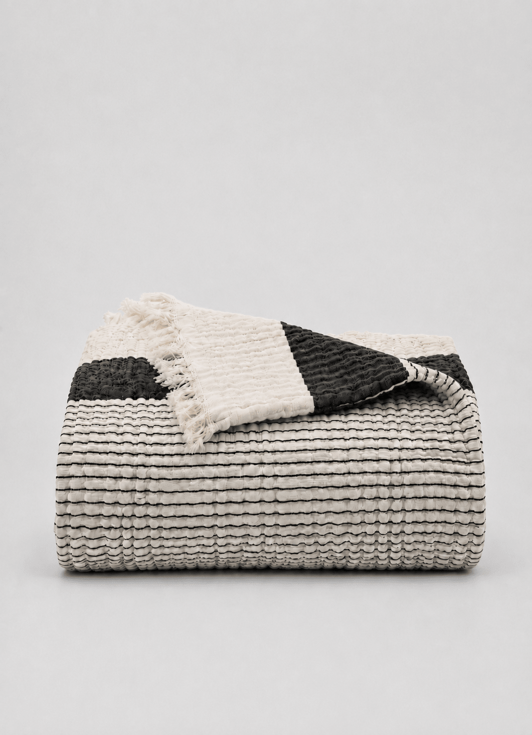 Aurea Muslin coverlet in Mineral — hero product shot of lightweight cotton muslin