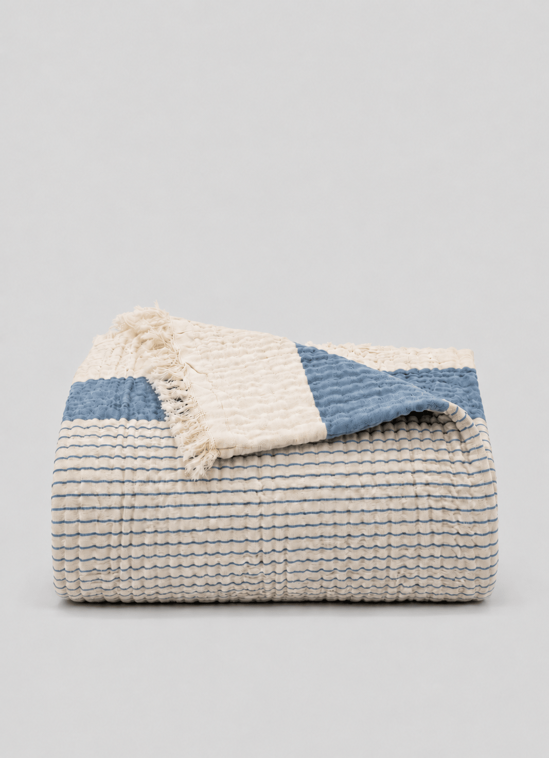 Aurea Muslin coverlet in Sky — hero shot of airy Turkish cotton muslin coverlet