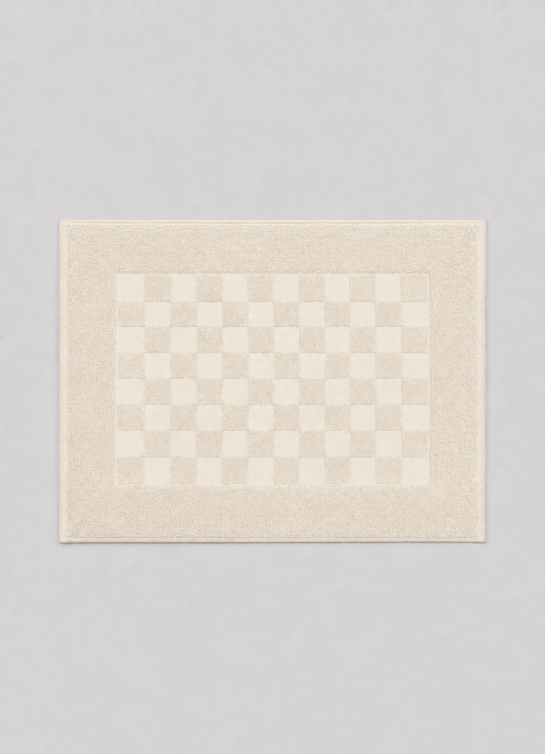 Marlow Check bath mat in Alabaster — hero shot of tonal checker Turkish cotton