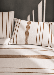 Silken Collection in Sand Line — close-up of silky-smooth fabric texture