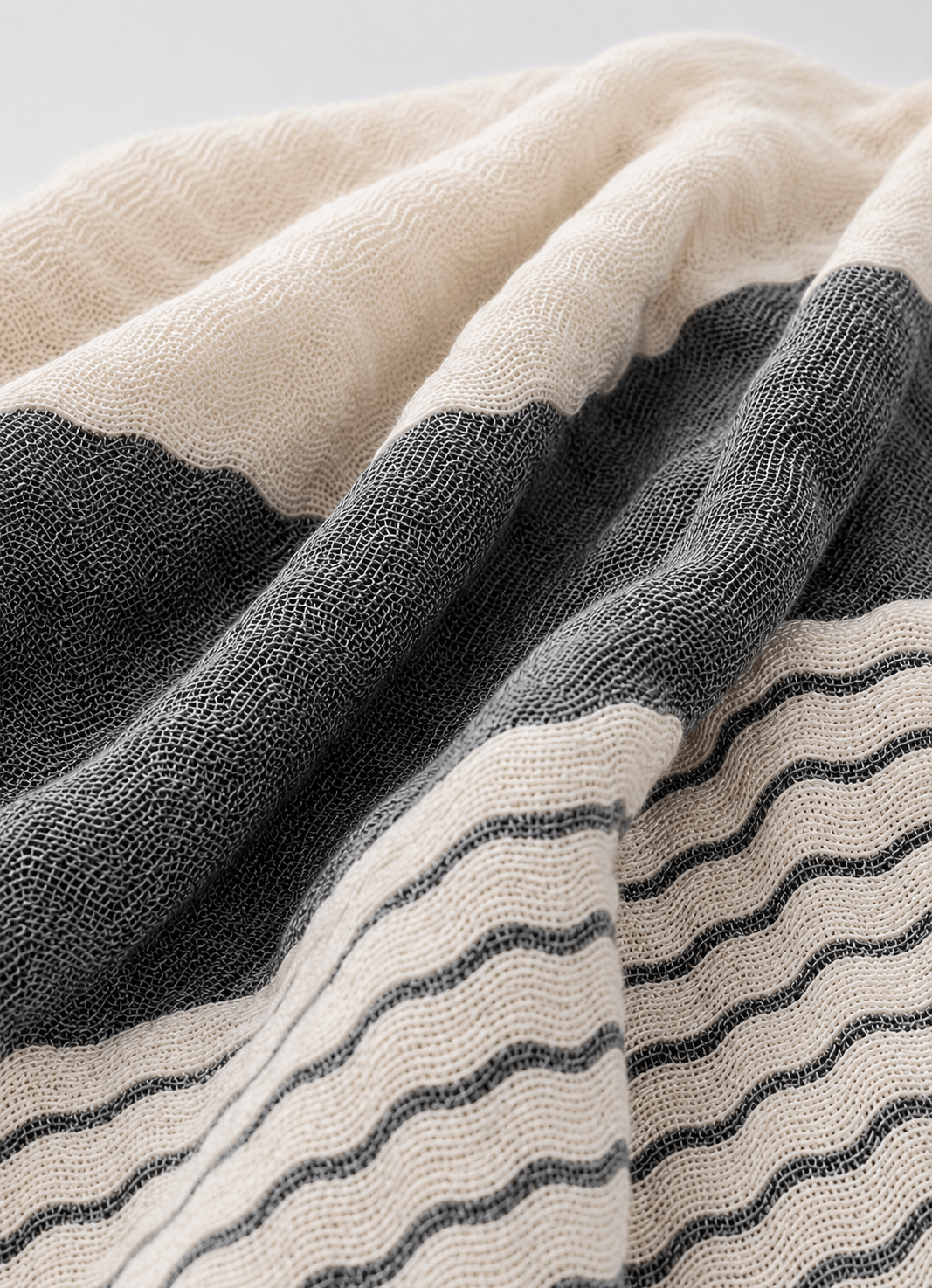 Aurea Muslin coverlet in Mineral — close-up texture detail of woven muslin