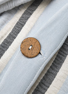 Textured Muslin bedding set in Seaglass — bedroom detail showing soft drape