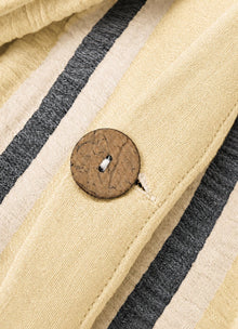 Textured Muslin bedding set in Sunlit — bedroom detail showing drape and softness